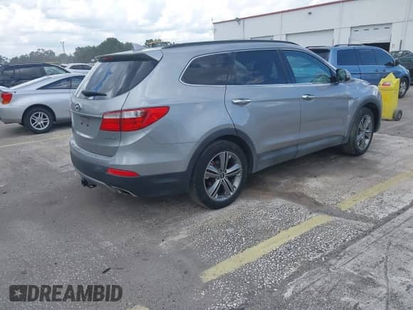 2015 Hyundai Santa Fe Limited with VIN KM8SN4HF0FU099846, listed as a IAAI auction lot 42921531 with 135,451 mi miles and . Bid and sale history available at DreamBid. Image 4.