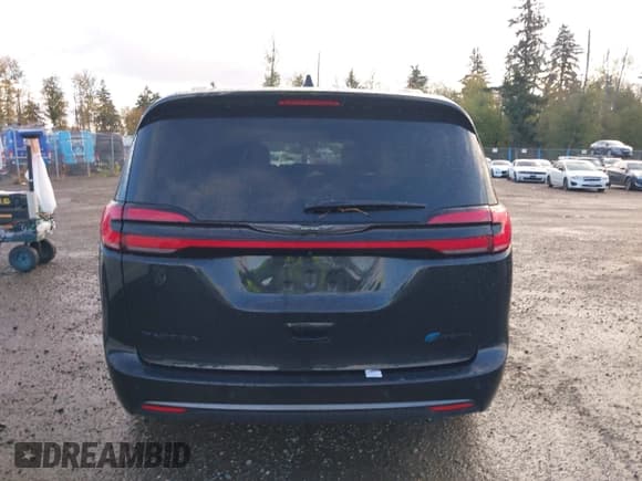 ✅ 2023 Chrysler Pacifica Hybrid Touring L • VIN: 2C4RC1L71PR589069 • Lot: 43541878. Listed on IAAI with 79,343 mi. Free auction sales archive from the USA and detailed vehicle history report at DreamBid. Image 17.