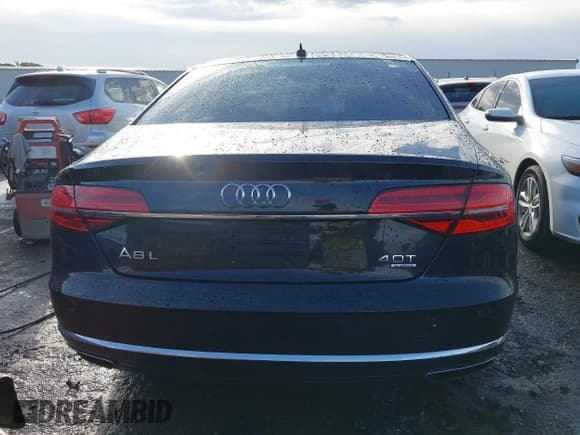 ✅ 2015 Audi A8 4.0T • VIN: WAU32AFD6FN022648 • Лот: 42358142. Опубликован ранее на IAAI с пробегом 103 416 миль. Бесплатный доступ к архиву аукционных продаж из США и подробный отчёт об истории автомобиля на DreamBid. Изображение 17.