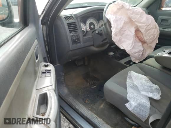 2005 Dodge Dakota SLT с VIN 1D7HW42N05S315223, выставлен на аукционе Copart как лот 71559234 с пробегом 127 204 миль миль и Списание • Salvage title. История ставок и продаж доступна на DreamBid. Изображение 8.