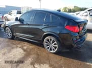 ✅ 2016 BMW X4 M40i • VIN: 5UXXW7C59G0M91223 • Lot: 42009394. Listed on IAAI with 144,771 mi. Free auction sales archive from the USA and detailed vehicle history report at DreamBid. Image 3.