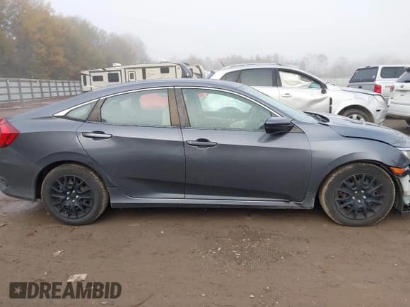 ✅ 2017 Honda Civic LX • VIN: 19XFC2F58HE006292 • Lot: 43586236. Listed on IAAI with 240,196 mi. Free auction sales archive from the USA and detailed vehicle history report at DreamBid. Image 13.