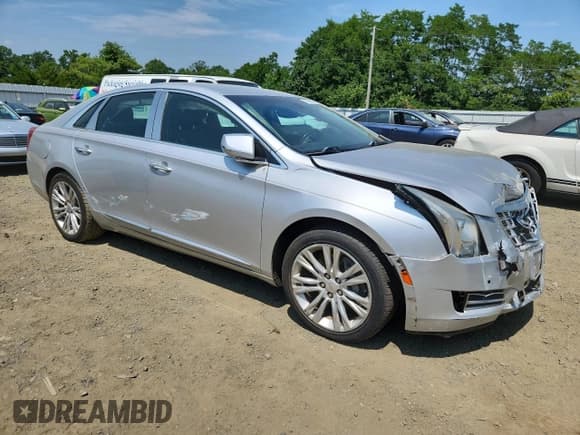 ✅ 2013 Cadillac XTS Luxury • VIN: 2G61R5S35D9220358 • Lot: 65884895. Wystawiony na Copart z przebiegiem 28 562 mil. Bezpłatny archiwum sprzedaży aukcyjnych z USA i szczegółowy raport historii pojazdu na DreamBid. Zdjęcie 4.