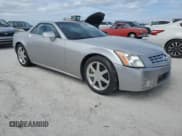 ✅ 2004 Cadillac XLR • VIN: 1G6YV34A945601007 • Lot: 77077394. Wystawiony na Copart z przebiegiem Nie podano. Bezpłatny archiwum sprzedaży aukcyjnych z USA i szczegółowy raport historii pojazdu na DreamBid. Zdjęcie 4.