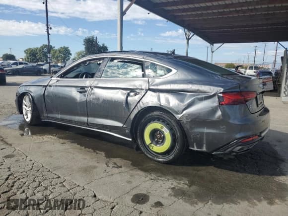 ✅ 2024 Audi A5 Sportback S line Premium Plus • VIN: WAUFACF53RA071001 • Лот: 86098045. Опубликован ранее на Copart с пробегом 22 911 миль. Бесплатный доступ к архиву аукционных продаж из США и подробный отчёт об истории автомобиля на DreamBid. Изображение 2.