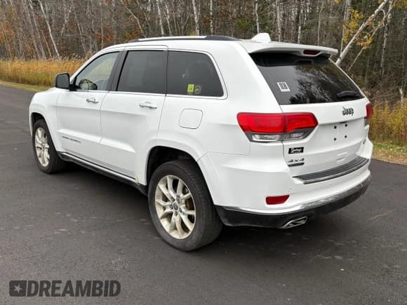 ✅ 2015 Jeep Grand Cherokee Summit • VIN: 1C4RJFJM8FC887279 • Lot: 92039305. Listed on Copart with 240,185 mi. Free auction sales archive from the USA and detailed vehicle history report at DreamBid. Image 3.
