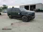 2023 Chevrolet Tahoe RST with VIN 1GNSKRKT1PR132227, listed as a Copart auction lot 57033255 with 30,133 mi miles and Salvage title. Bid and sale history available at DreamBid. Image 14.