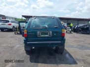 ✅ 1999 Isuzu Rodeo S • VIN: 4S2CK58W6X4332027 • Lot: 42087396. Listed on IAAI with 258,508 mi. Free auction sales archive from the USA and detailed vehicle history report at DreamBid. Image 15.