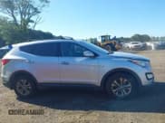 ✅ 2014 Hyundai Santa Fe • VIN: 5XYZUDLB4EG205418 • Lot: 43058157. Listed on IAAI with 137,818 mi. Free auction sales archive from the USA and detailed vehicle history report at DreamBid. Image 13.