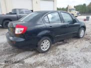 ✅ 2013 Suzuki SX4 LE • VIN: JS2YC5A31D6102366 • Lot: 43660138. Wystawiony na IAAI z przebiegiem 117 339 mil. Bezpłatny archiwum sprzedaży aukcyjnych z USA i szczegółowy raport historii pojazdu na DreamBid. Zdjęcie 4.