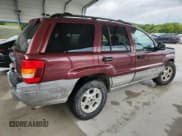 ✅ 2000 Jeep Grand Cherokee Laredo • VIN: 1J4GW48S1YC389472 • Lot: 81714815. Listed on Copart with 266,871 mi. Free auction sales archive from the USA and detailed vehicle history report at DreamBid. Image 3.