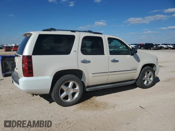 ✅ 2013 Chevrolet Tahoe LTZ • VIN: 1GNSCCE01DR332192 • Lot: 86290515. Listed on Copart with 174,232 mi. Free auction sales archive from the USA and detailed vehicle history report at DreamBid. Image 3.