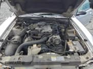 ✅ 2003 Ford Mustang Deluxe • VIN: 1FAFP44483F419943 • Lot: 94193385. Listed on Copart with 265,845 mi. Free auction sales archive from the USA and detailed vehicle history report at DreamBid. Image 11.