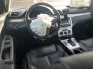 ✅ 2009 Volkswagen Passat Komfort • VIN: WVWJK73C09P058529 • Lot: 93400765. Listed on Copart with Not provided. Free auction sales archive from the USA and detailed vehicle history report at DreamBid. Image 8.