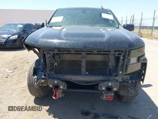 ✅ 2021 Chevrolet Silverado 1500 Custom Trail Boss • VIN: 1GCPYCEFXMZ261238 • Lot: 42700257. Wystawiony na IAAI z przebiegiem 64 975 mil. Bezpłatny archiwum sprzedaży aukcyjnych z USA i szczegółowy raport historii pojazdu na DreamBid. Zdjęcie 6.