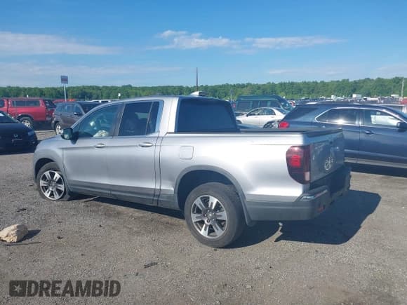 ✅ 2017 Honda Ridgeline RTL-T • VIN: 5FPYK3F64HB022095 • Lot: 42219954. Listed on IAAI with 85,876 mi. Free auction sales archive from the USA and detailed vehicle history report at DreamBid. Image 13.