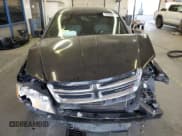 ✅ 2014 Dodge Avenger SE • VIN: 1C3CDZAB7EN112797 • Лот: 51329475. Опубликован ранее на Copart с пробегом 131 013 миль. Бесплатный доступ к архиву аукционных продаж из США и подробный отчёт об истории автомобиля на DreamBid. Изображение 5.