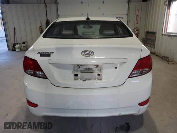 2015 Hyundai Accent GLS z VIN KMHCT4AE8FU924933, wystawiony jako Copart lot #90636105 z przebiegiem 465 167 mil mil oraz Czysty tytuł • Clean title. Historia ofert i sprzedaży dostępna na DreamBid. Obrazek 6.