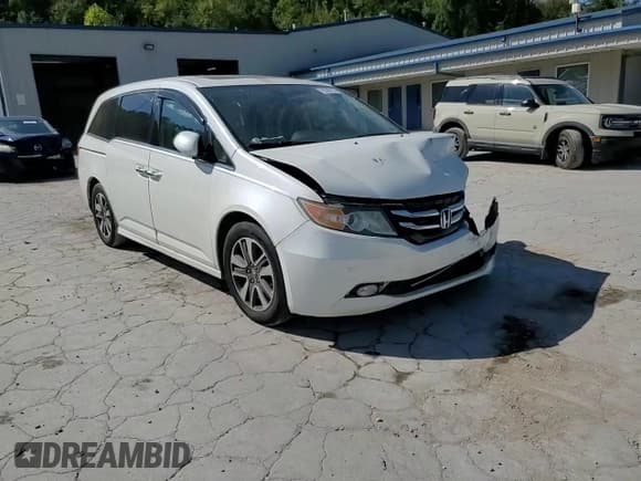 ✅ 2014 Honda Odyssey Touring • VIN: 5FNRL5H98EB107871 • Lot: 85380155. Wystawiony na Copart z przebiegiem 169 829 mil. Bezpłatny archiwum sprzedaży aukcyjnych z USA i szczegółowy raport historii pojazdu na DreamBid. Zdjęcie 14.