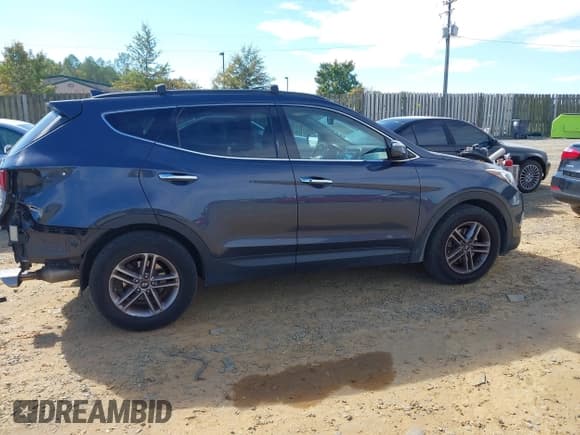 ✅ 2018 Hyundai Santa Fe 2.4L • VIN: 5NMZUDLBXJH059736 • Лот: 43445713. Опубликован ранее на IAAI с пробегом 138 393 миль. Бесплатный доступ к архиву аукционных продаж из США и подробный отчёт об истории автомобиля на DreamBid. Изображение 14.