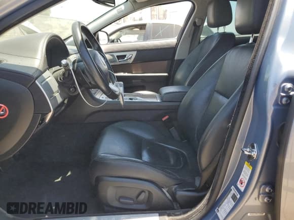 ✅ 2013 Jaguar XF RWD • VIN: SAJWA0E77D8S91277 • Lot: 63109595. Listed on Copart with 81,735 mi. Free auction sales archive from the USA and detailed vehicle history report at DreamBid. Image 7.