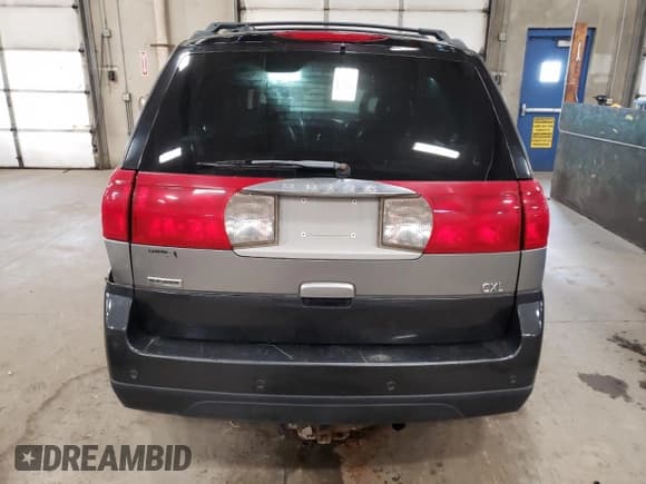 ✅ 2003 Buick Rendezvous CXL • VIN: 3G5DB03E43S598147 • Лот: 80659204. Опубликован ранее на Copart с пробегом 155 641 миль. Бесплатный доступ к архиву аукционных продаж из США и подробный отчёт об истории автомобиля на DreamBid. Изображение 6.