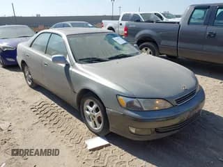 ✅ 2001 Lexus ES 300 • VIN: JT8BF28G315105266 • Lot: 43497522. Wystawiony na IAAI z przebiegiem 169 192 mil. Bezpłatny archiwum sprzedaży aukcyjnych z USA i szczegółowy raport historii pojazdu na DreamBid. Zdjęcie 1.