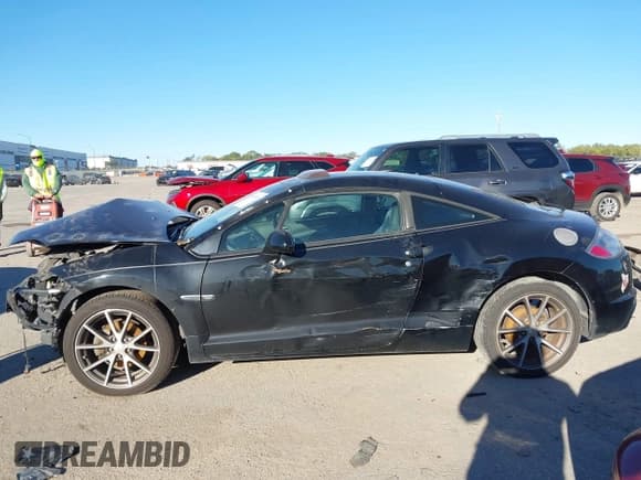 ✅ 2011 Mitsubishi Eclipse GS • VIN: 4A31K5DF2BE001261 • Lot: 43545100. Listed on IAAI with 153,032 mi. Free auction sales archive from the USA and detailed vehicle history report at DreamBid. Image 15.