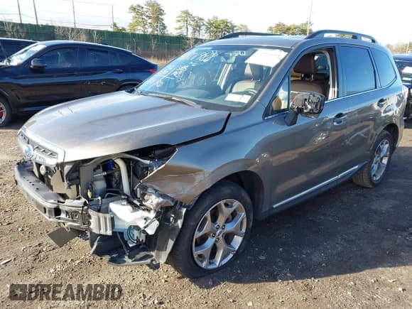 ✅ 2017 Subaru Forester Touring • VIN: JF2SJAWC9HH507636 • Lot: 41801988. Listed on IAAI with 32,030 mi. Free auction sales archive from the USA and detailed vehicle history report at DreamBid. Image 2.