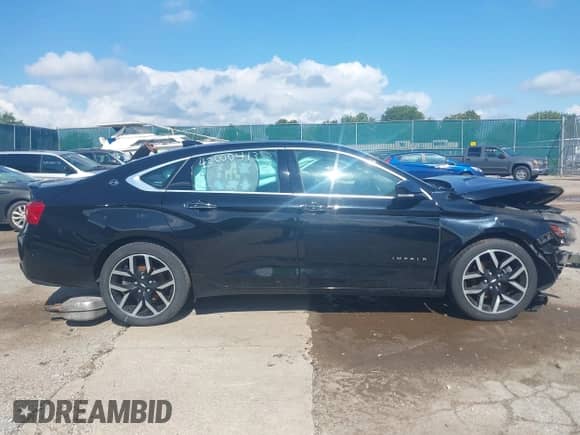 2017 Chevrolet Impala Premier with VIN 2G1145S31H9194433, listed as a IAAI auction lot 43000413 with 120,540 mi miles and . Bid and sale history available at DreamBid. Image 14.