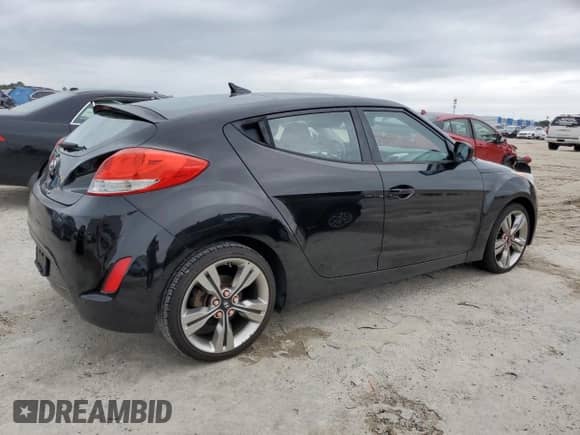 ✅ 2013 Hyundai Veloster w/Gray Int • VIN: KMHTC6AD9DU162356 • Лот: 71284144. Размещён на Copart с пробегом 118 439 миль миль. Получите бесплатный доступ к архиву аукционных продаж из США и посмотрите подробный отчёт об истории автомобиля на DreamBid. Изображение 3.