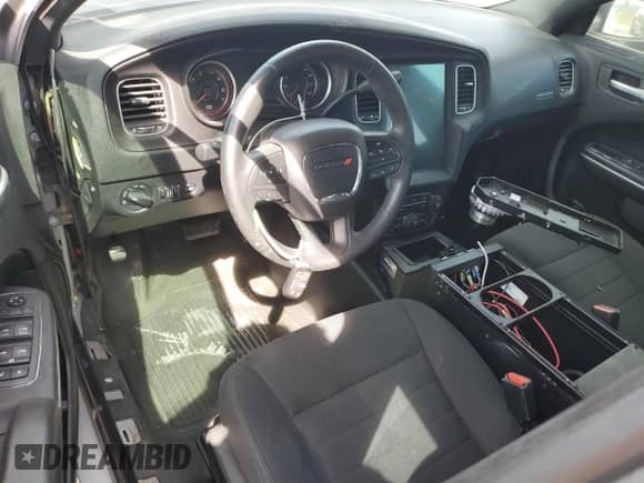 2019 Dodge Charger Police with VIN 2C3CDXAT6KH579890, listed as a Copart auction lot 85170295 with 130,334 mi miles and Clean title. Bid and sale history available at DreamBid. Image 8.