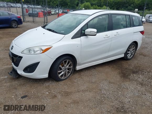 ✅ 2013 Mazda 5 Touring • VIN: JM1CW2CL2D0153269 • Lot: 42865405. Listed on IAAI with Not provided. Free auction sales archive from the USA and detailed vehicle history report at DreamBid. Image 2.