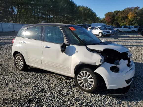 ✅ 2014 FIAT 500L Easy • VIN: ZFBCFABH4EZ023856 • Lot: 76285024. Listed on Copart with 131,343 mi. Free auction sales archive from the USA and detailed vehicle history report at DreamBid. Image 4.