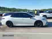 2021 Toyota Camry Hybrid XSE with VIN 4T1K31AK4MU024933, listed as a IAAI auction lot 42316758 with 97,630 mi miles and . Bid and sale history available at DreamBid. Image 13.