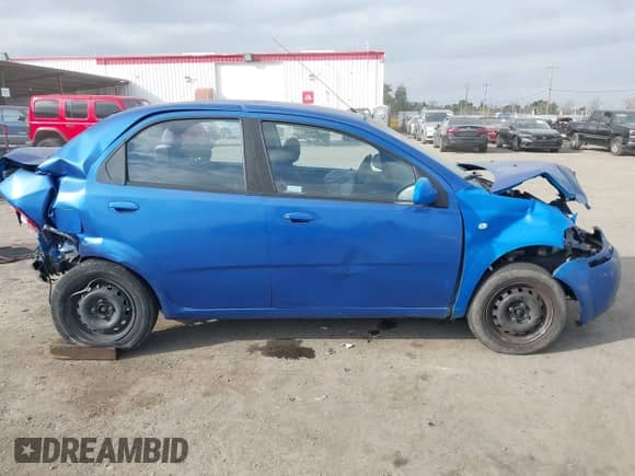 2006 Chevrolet Aveo LS z VIN KL1TD56696B543863, wystawiony jako IAAI lot #41446969 z przebiegiem 222 866 mil mil oraz . Historia ofert i sprzedaży dostępna na DreamBid. Obrazek 13.