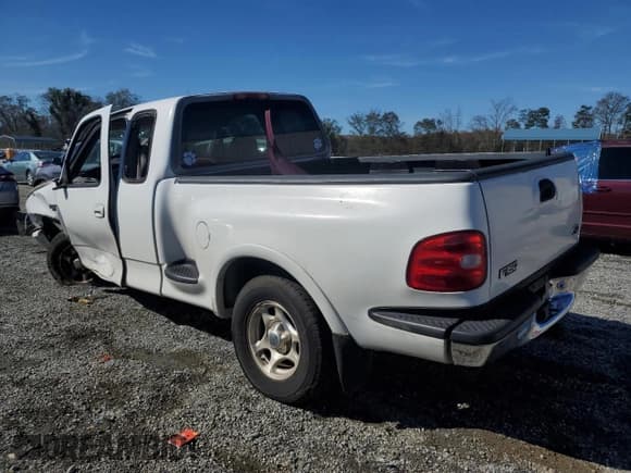 ✅ 1998 Ford F-150 XL • VIN: 1FTZX08W6WKA55383 • Lot: 80040264. Listed on Copart with 180,786 mi. Free auction sales archive from the USA and detailed vehicle history report at DreamBid. Image 2.
