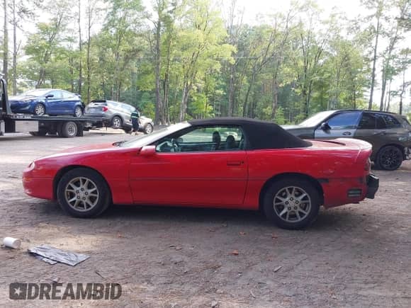 2002 Chevrolet Camaro z VIN 2G1FP32K522138620, wystawiony jako IAAI lot #43319461 z przebiegiem 143 190 mil mil oraz . Historia ofert i sprzedaży dostępna na DreamBid. Obrazek 14.