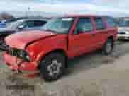 2002 Chevrolet Blazer LS z VIN 1GNDT13W82K225084, wystawiony jako Copart lot #80815644 z przebiegiem 107 485 mil mil oraz Szkoda całkowita • Salvage title. Historia ofert i sprzedaży dostępna na DreamBid. Obrazek 1.