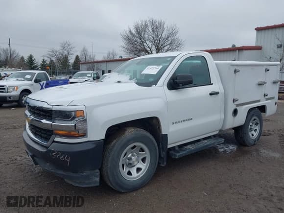✅ 2018 Chevrolet Silverado 1500 Work Truck • VIN: 1GCNCNEH2JZ264147 • Лот: 41413764. Опубликован ранее на IAAI с пробегом 98 985 миль. Бесплатный доступ к архиву аукционных продаж из США и подробный отчёт об истории автомобиля на DreamBid. Изображение 19.