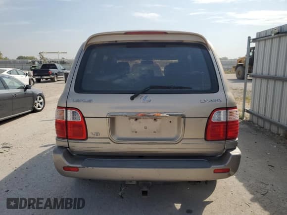 ✅ 2001 Lexus LX 470 • VIN: JTJHT00W913502047 • Lot: 81184935. Listed on Copart with 152,205 mi. Free auction sales archive from the USA and detailed vehicle history report at DreamBid. Image 6.