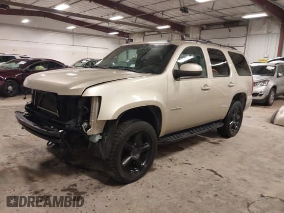 ✅ 2013 Chevrolet Tahoe LT • VIN: 1GNSKBE08DR215142 • Lot: 43665019. Listed on IAAI with 203,239 mi. Free auction sales archive from the USA and detailed vehicle history report at DreamBid. Image 2.