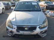 ✅ 2010 Kia Rio LX • VIN: KNADH4A38A6673706 • Lot: 43645629. Listed on IAAI with 145,094 mi. Free auction sales archive from the USA and detailed vehicle history report at DreamBid. Image 12.