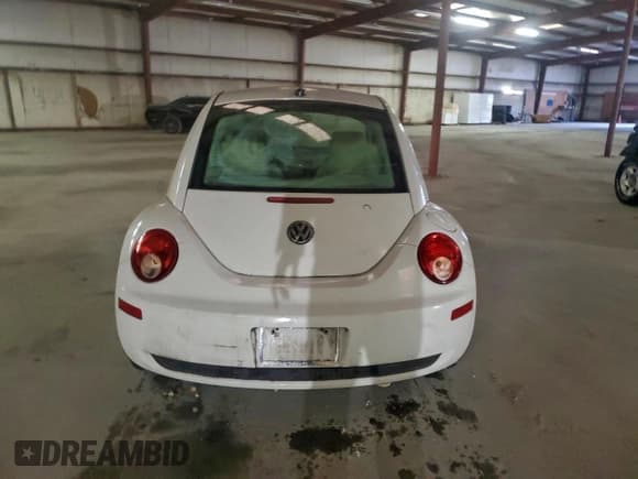✅ 2009 Volkswagen Beetle S • VIN: 3VWRW31C69M506116 • Lot: 93557455. Listed on Copart with 99,308 mi. Free auction sales archive from the USA and detailed vehicle history report at DreamBid. Image 6.