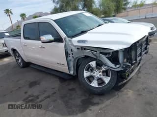 ✅ 2022 Ram 1500 Laramie • VIN: 1C6RREJTXNN357898 • Lot: 41966113. Listed on IAAI with 57,947 mi. Free auction sales archive from the USA and detailed vehicle history report at DreamBid. Image 1.