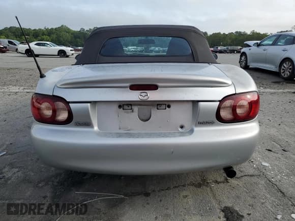 ✅ 2003 Mazda MX-5 Miata Cloth • VIN: JM1NB353630305964 • Lot: 58517505. Listed on Copart with 129,675 mi. Free auction sales archive from the USA and detailed vehicle history report at DreamBid. Image 6.