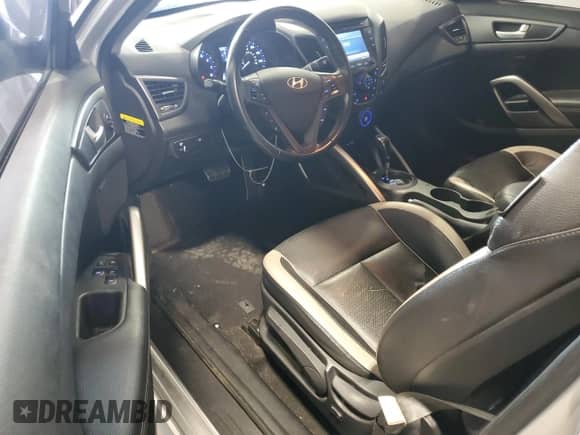 2014 Hyundai Veloster Turbo z VIN KMHTC6AE2EU208474, wystawiony jako Copart lot #65442584 z przebiegiem 57 596 mil mil oraz Szkoda całkowita • Salvage title. Historia ofert i sprzedaży dostępna na DreamBid. Obrazek 8.