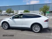 ✅ 2021 Tesla Model X Long Range Plus • VIN: 5YJXCDE27MF322200 • Lot: 42360282. Listed on IAAI with 37,072 mi. Free auction sales archive from the USA and detailed vehicle history report at DreamBid. Image 14.