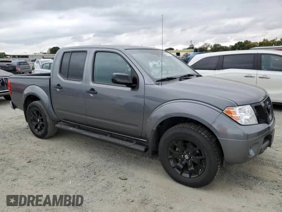 2021 Nissan Frontier Pro-4X with VIN 1N6ED0EB8MN706577, listed as a Copart auction lot 84050325 with 75,821 mi miles and Salvage title. Bid and sale history available at DreamBid. Image 4.