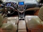 ✅ 2012 Cadillac SRX Premium Collection • VIN: 3GYFNCE39CS561384 • Lot: 96707565. Wystawiony na Copart z przebiegiem 180 316 mil. Bezpłatny archiwum sprzedaży aukcyjnych z USA i szczegółowy raport historii pojazdu na DreamBid. Zdjęcie 8.